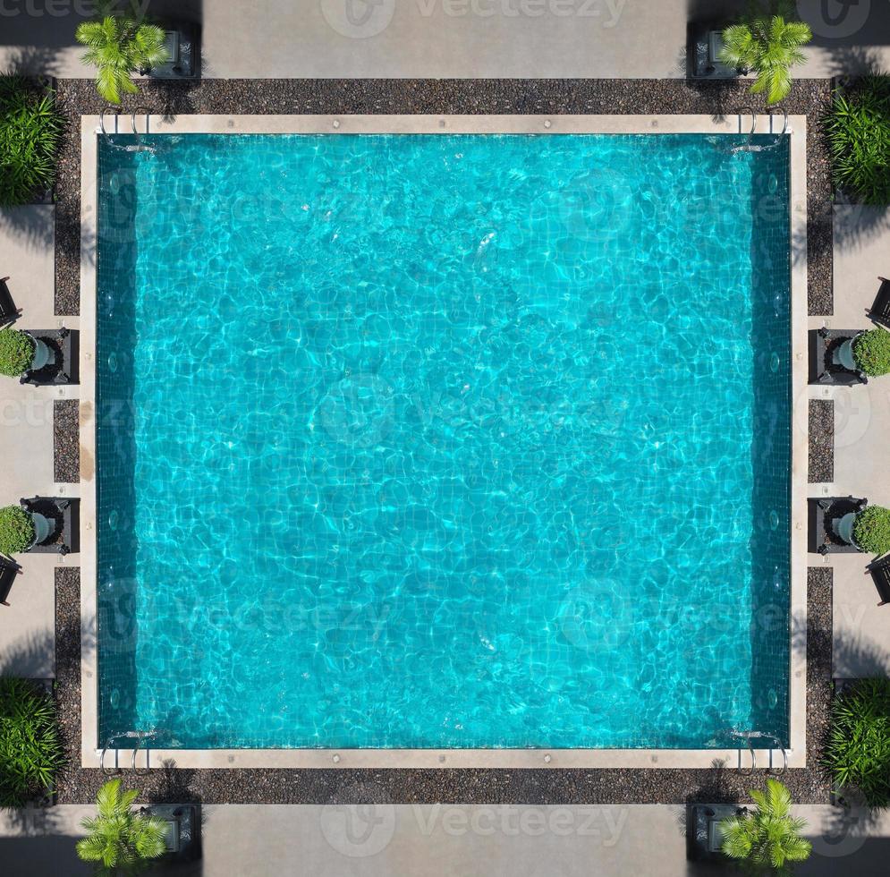 Aerial view images of swimming pool in a sunny day. photo