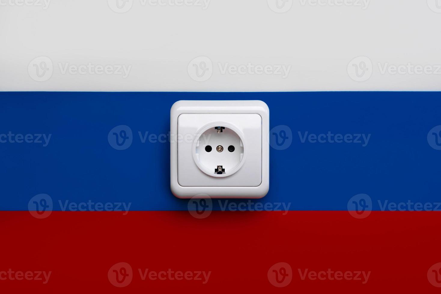 National flag of Russia with electricity outlet socket power plug photo