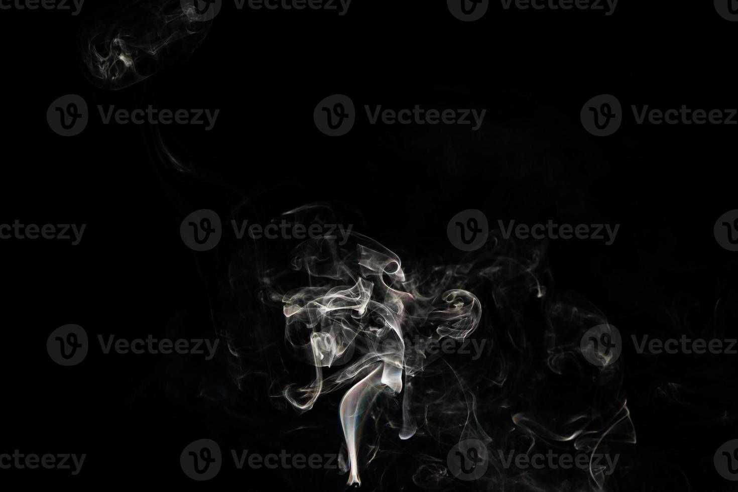 Smoke effect texture. Isolated background. Black and dark backdrop. Smokey fire and mistic effect. photo