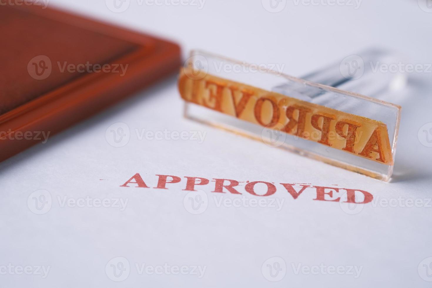 Stamping Document with Approving Contract close up photo