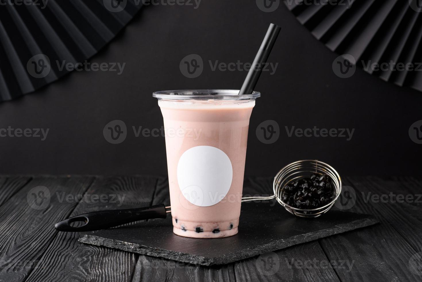 Taiwan milk tea with bubble on wood background photo