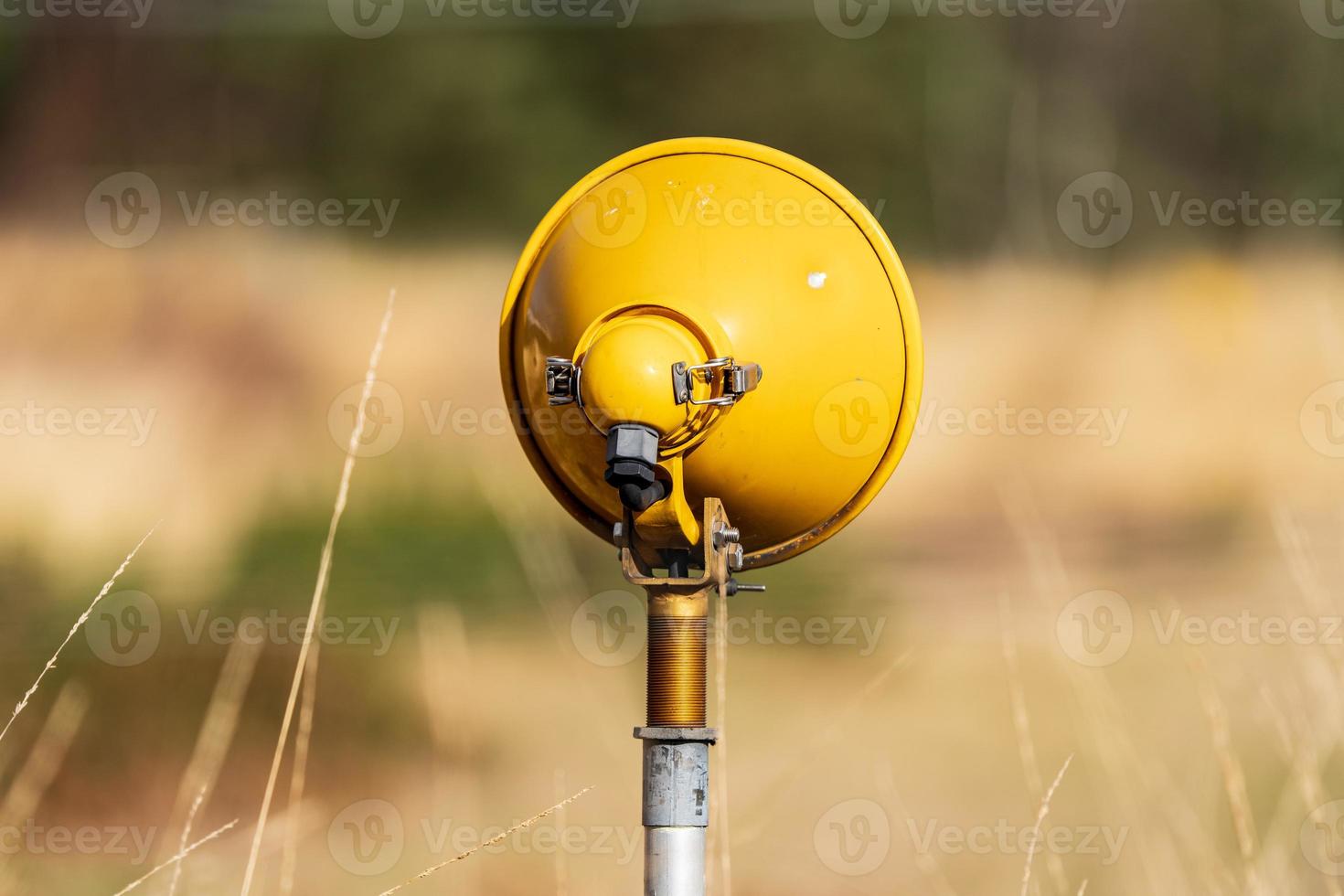 Airport Landing Light Upclose In A Field photo