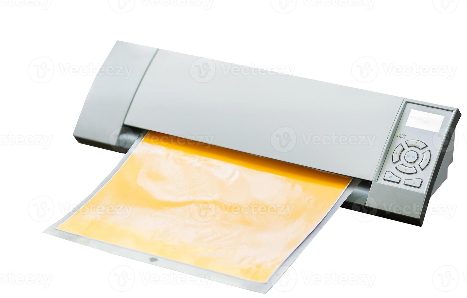 Cutting plotter. Paper cut machine for scrapbook isolated on white background. Craft equipment with sticky pad photo