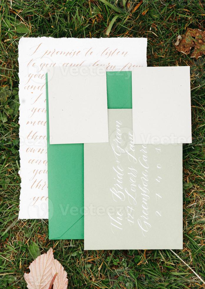 Wedding details flat lay. Wedding invitation. Wedding bouquet. Mock up. Envelope. Copy space. photo