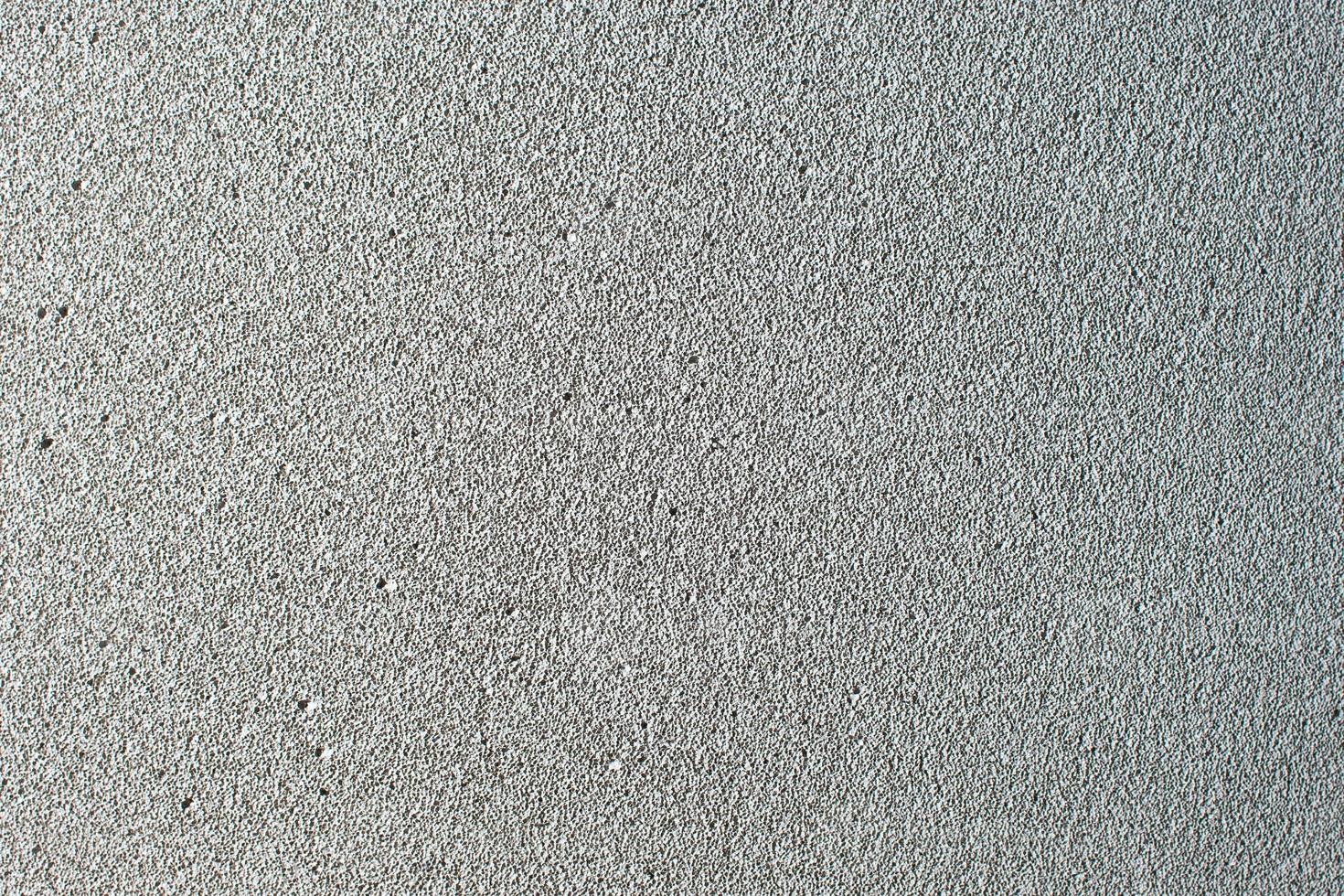 pared de bloques de hormigón celular como fondo gris. ladrillo de construcción ligera aislado en blanco. bloque de yeso espumado ligero aislado en blanco. foto