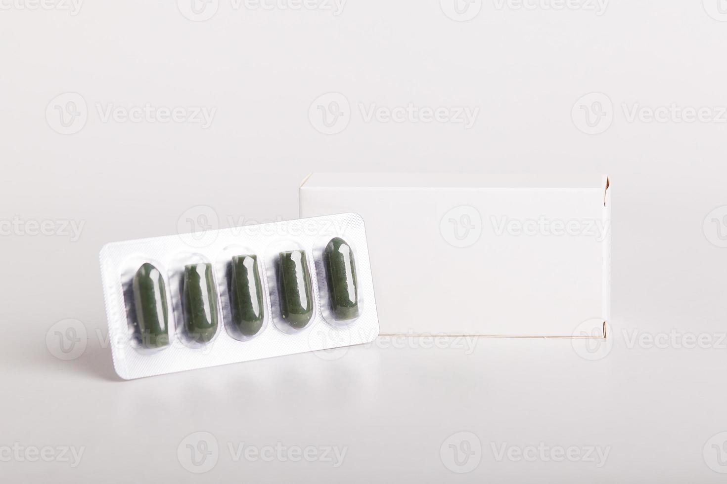 White pills box. Plastic bottles. Drugs box mock-up. Medical blank cardboard. Mockup. Pills bottle photo