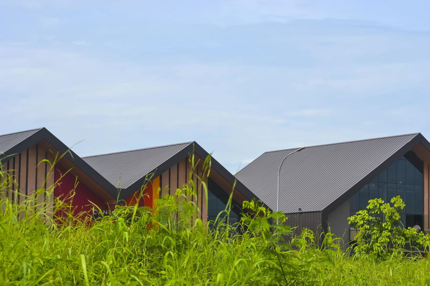 Summarecon, Bekasi, West Java, Indonesia, March 5th 2022.Tropical roofs on commercial estate buildings photo