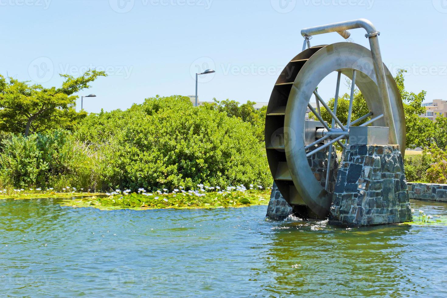 Watermill in lake pond in Green Point Park Cape Town. photo