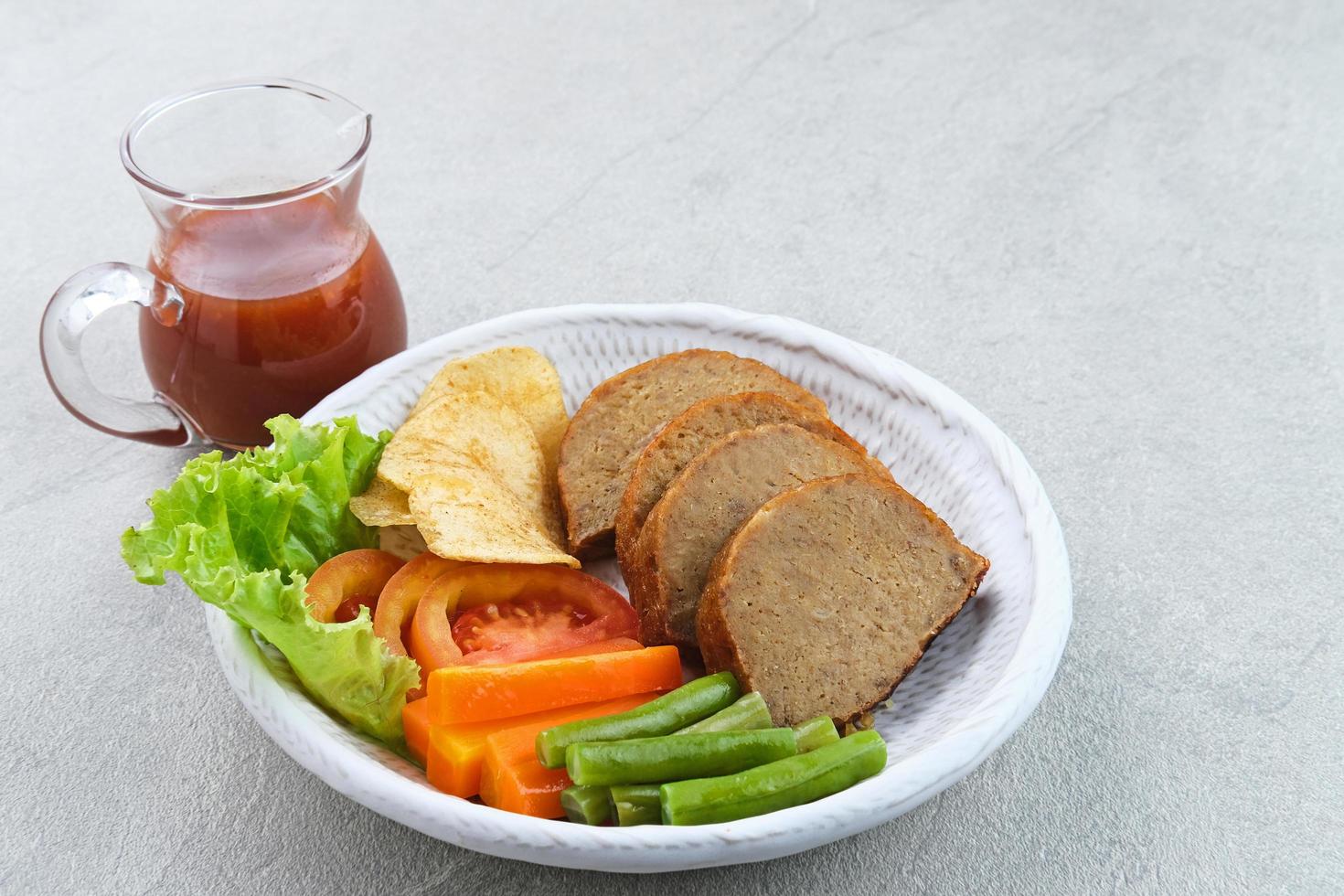 Selat solo galantin is a traditional Javanese dish that has European influences and originates from Solo, Central Java. Consisting of meat and vegetables. photo