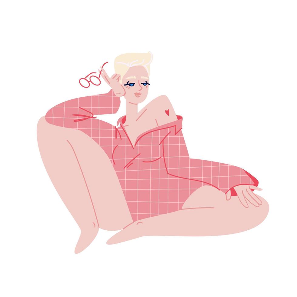 sexy rubia tímida en una camisa a cuadros con un tatuaje de corazón. joven mujer de ojos azules con gafas rojas en la mano apoyada en la rodilla. ilustración aislada de stock vectorial en estilo de dibujos animados. vector