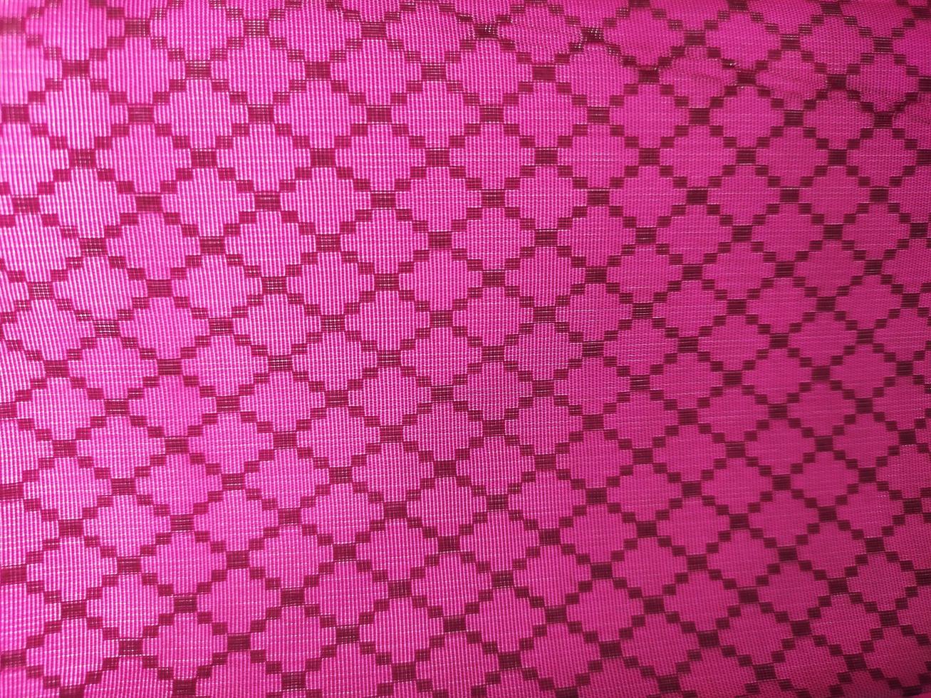 pink fabric texture background with square pattern photo