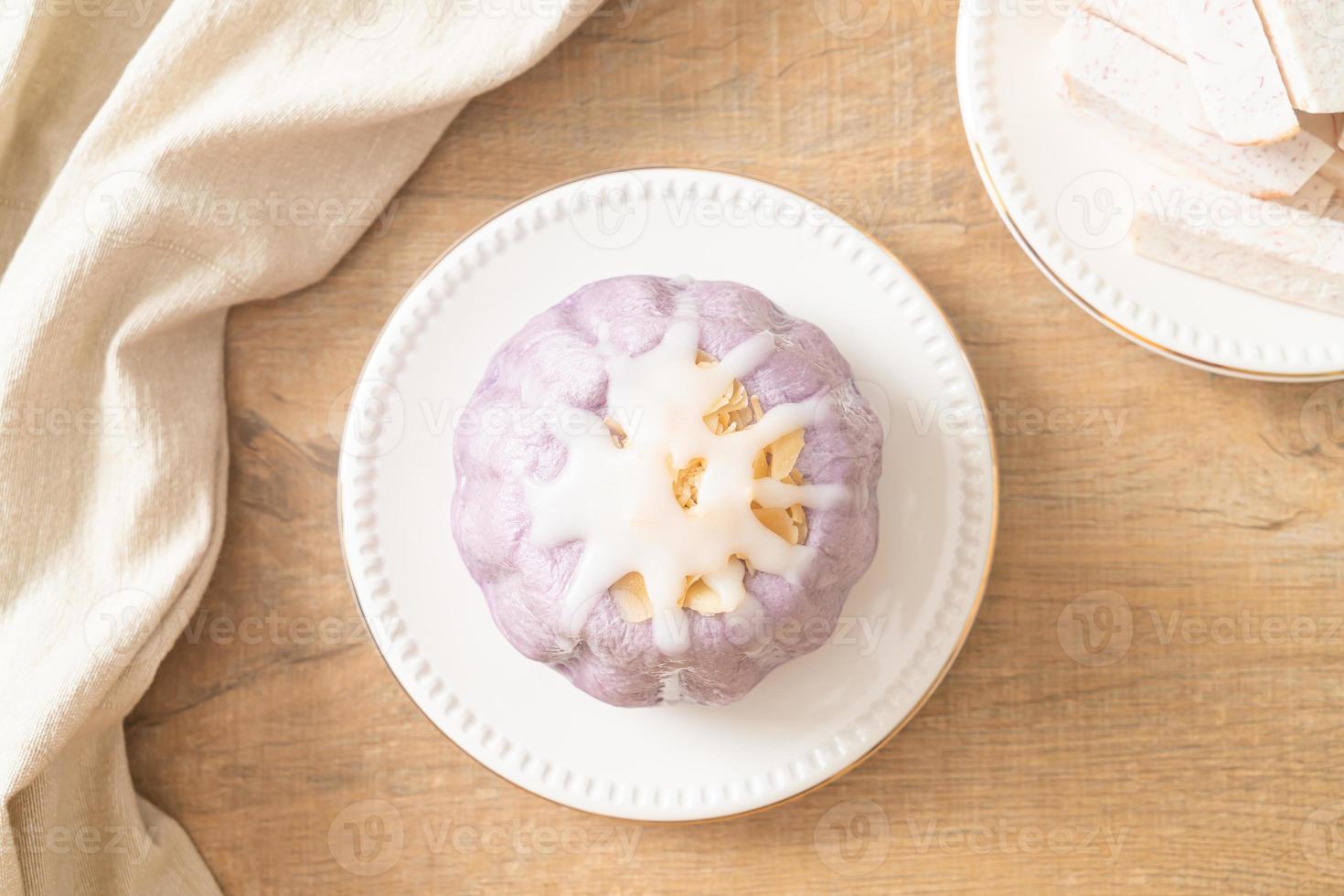 taro bun with white sugar cream and nut photo