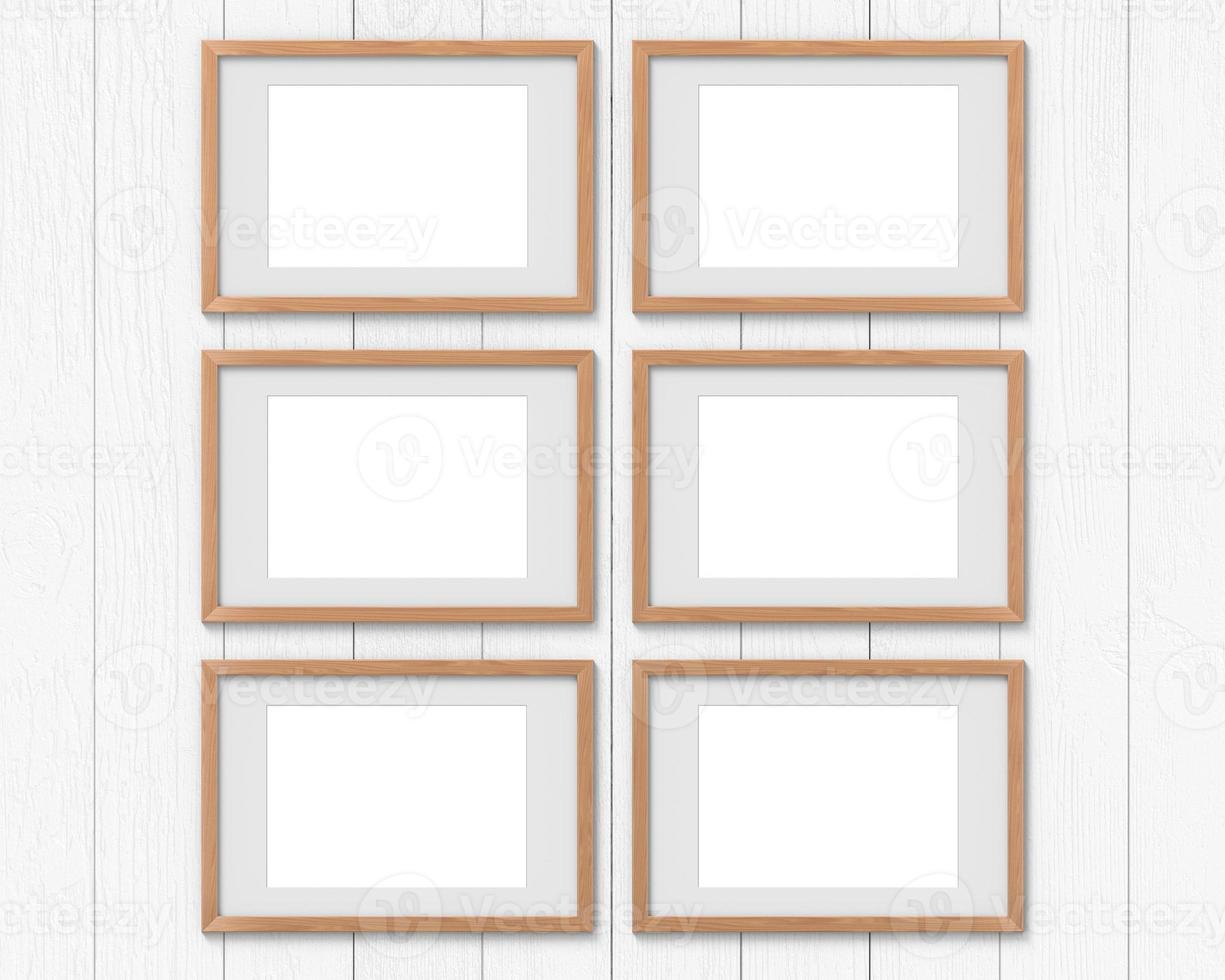 Set of 6 horizontal wooden frames mockup with a border hanging on the wall. Empty base for picture or text. 3D rendering. photo