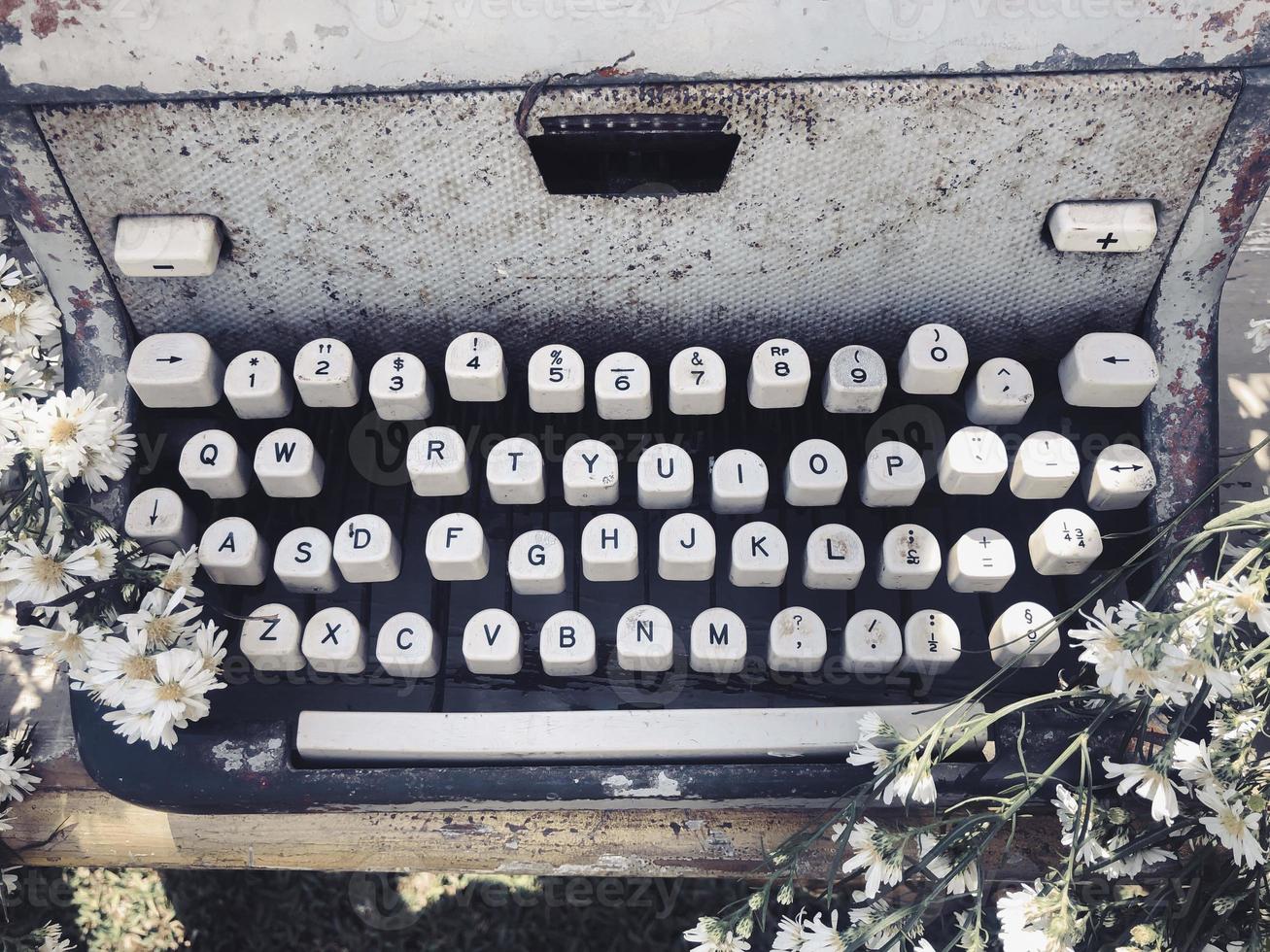 View of an antique manual Underwood typewriter on sepia photo