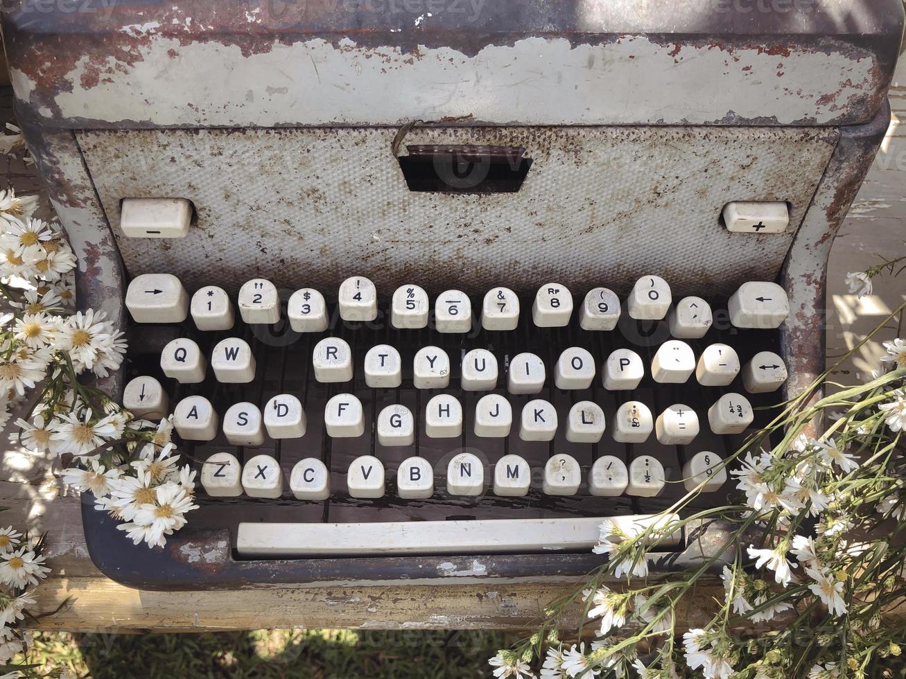 View of an antique manual Underwood typewriter on sepia photo