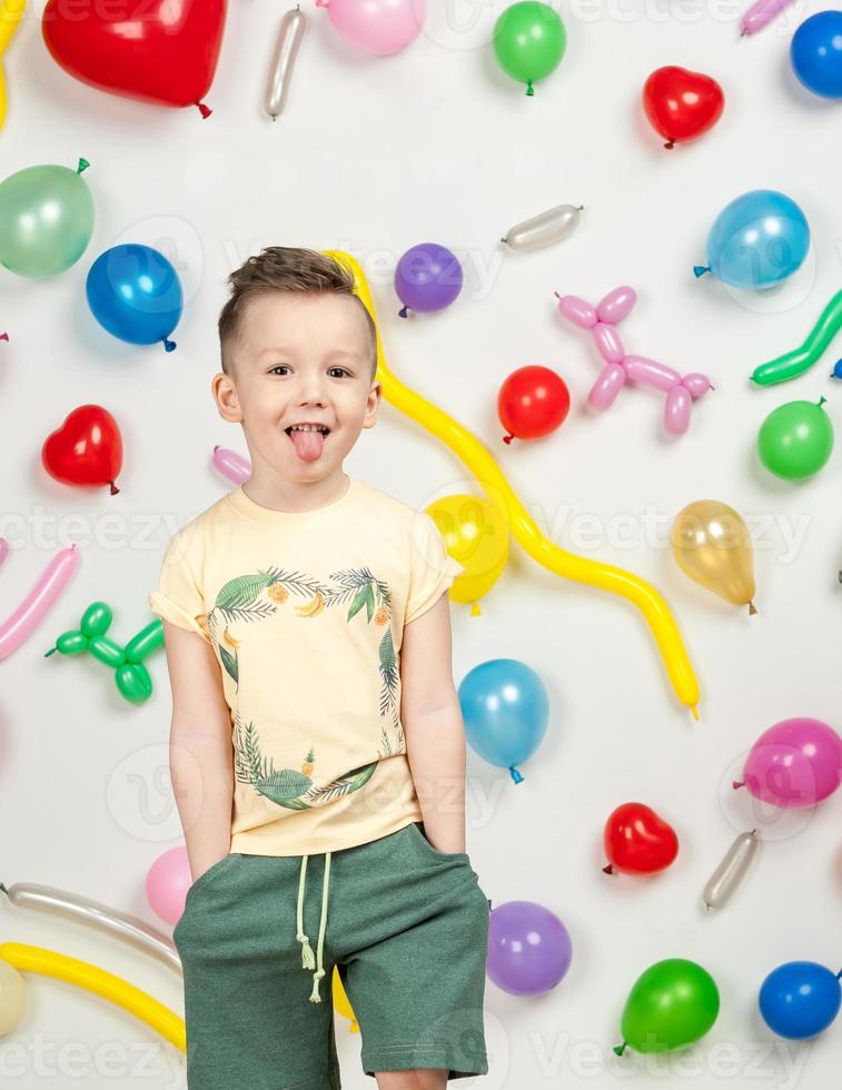 boy in the background of balls photo