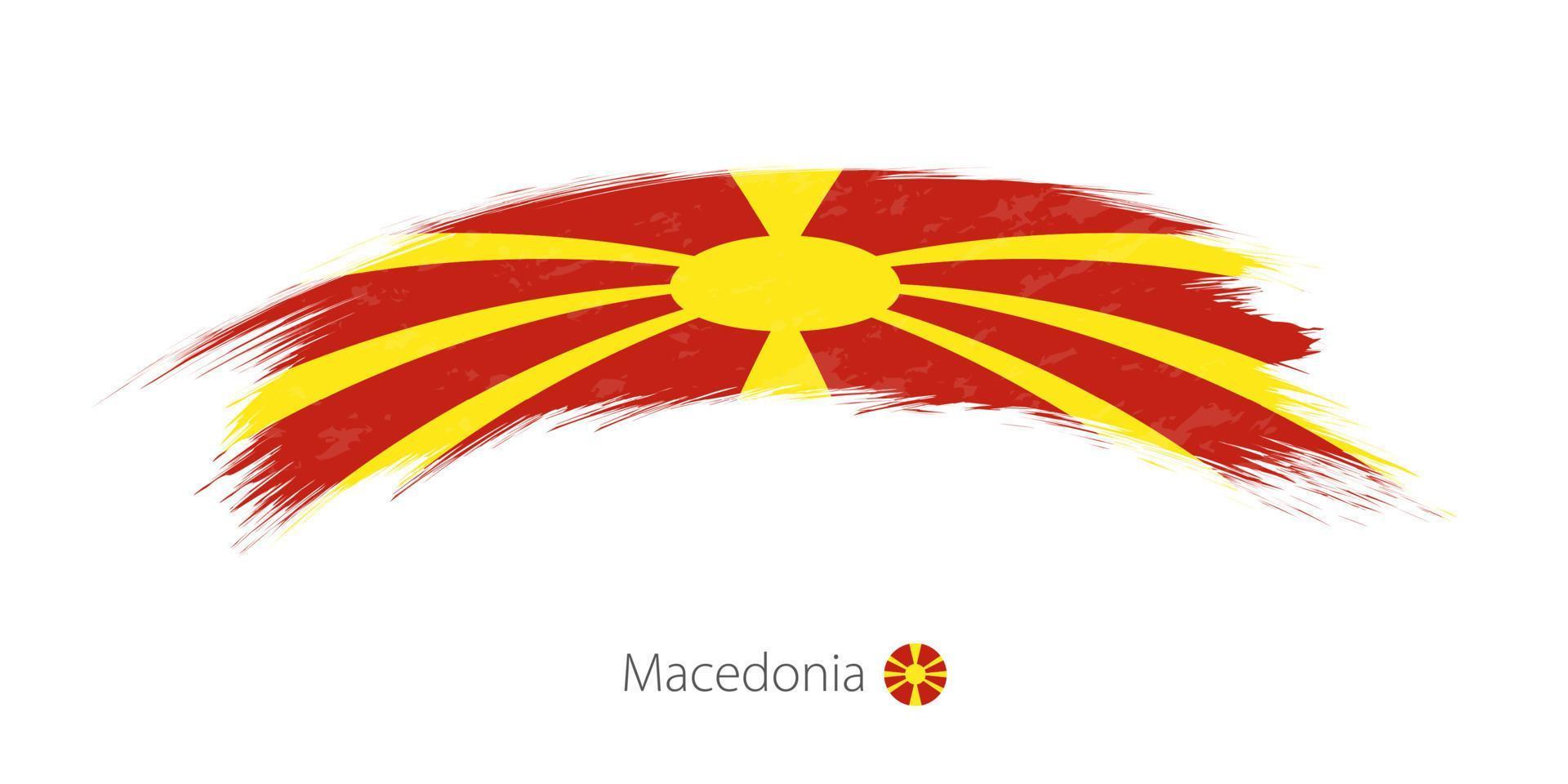 Flag of Macedonia in rounded grunge brush stroke. vector
