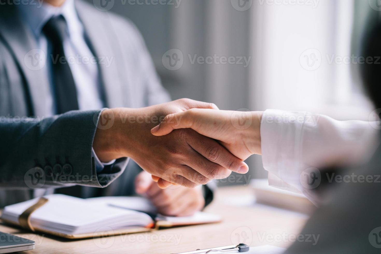 Asian male director is interviewing to recruit new employees photo