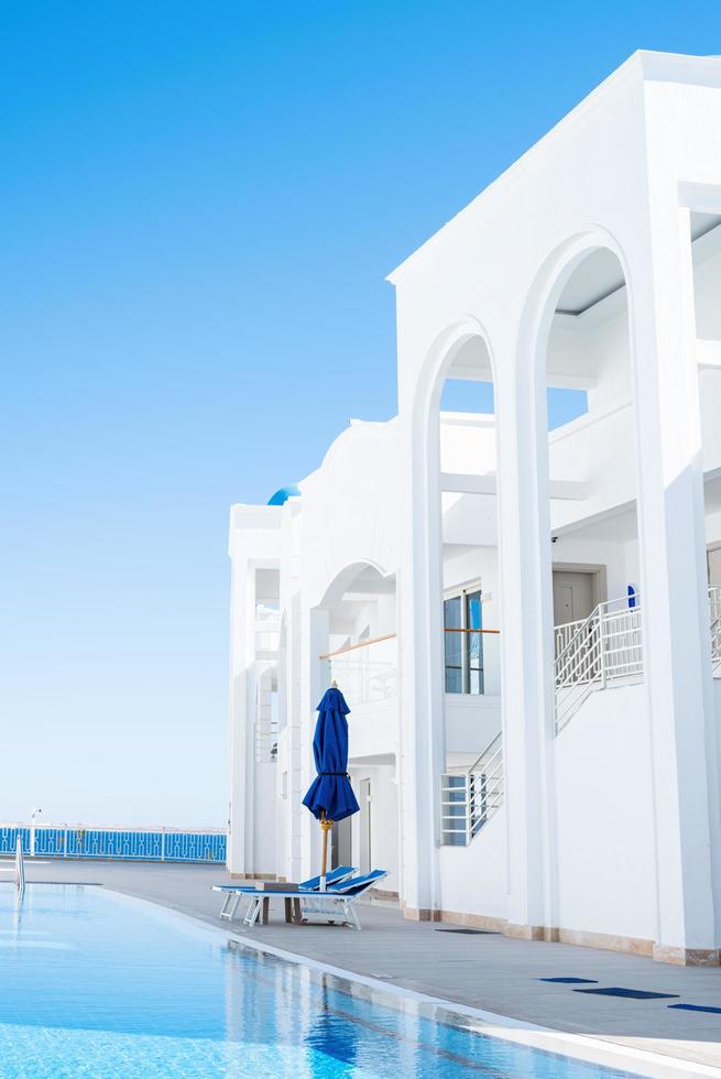 Sharm-El-Sheikh, Egypt, 2022 - Luxury hotel with pool against blue sky photo