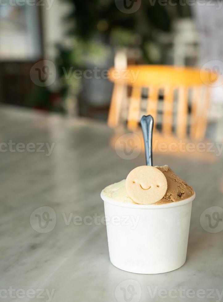 ice-cream with biscuit in cup photo