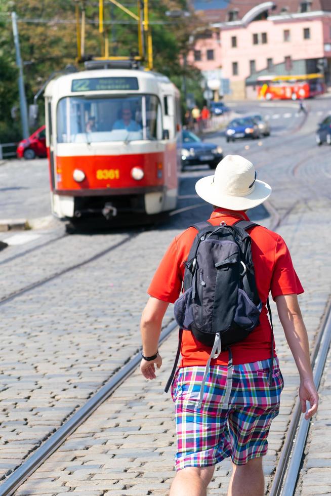 tourist walk in street photo