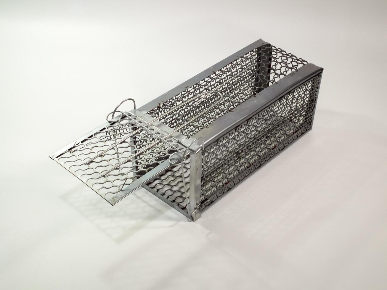 Cage mouse trap on white background photo