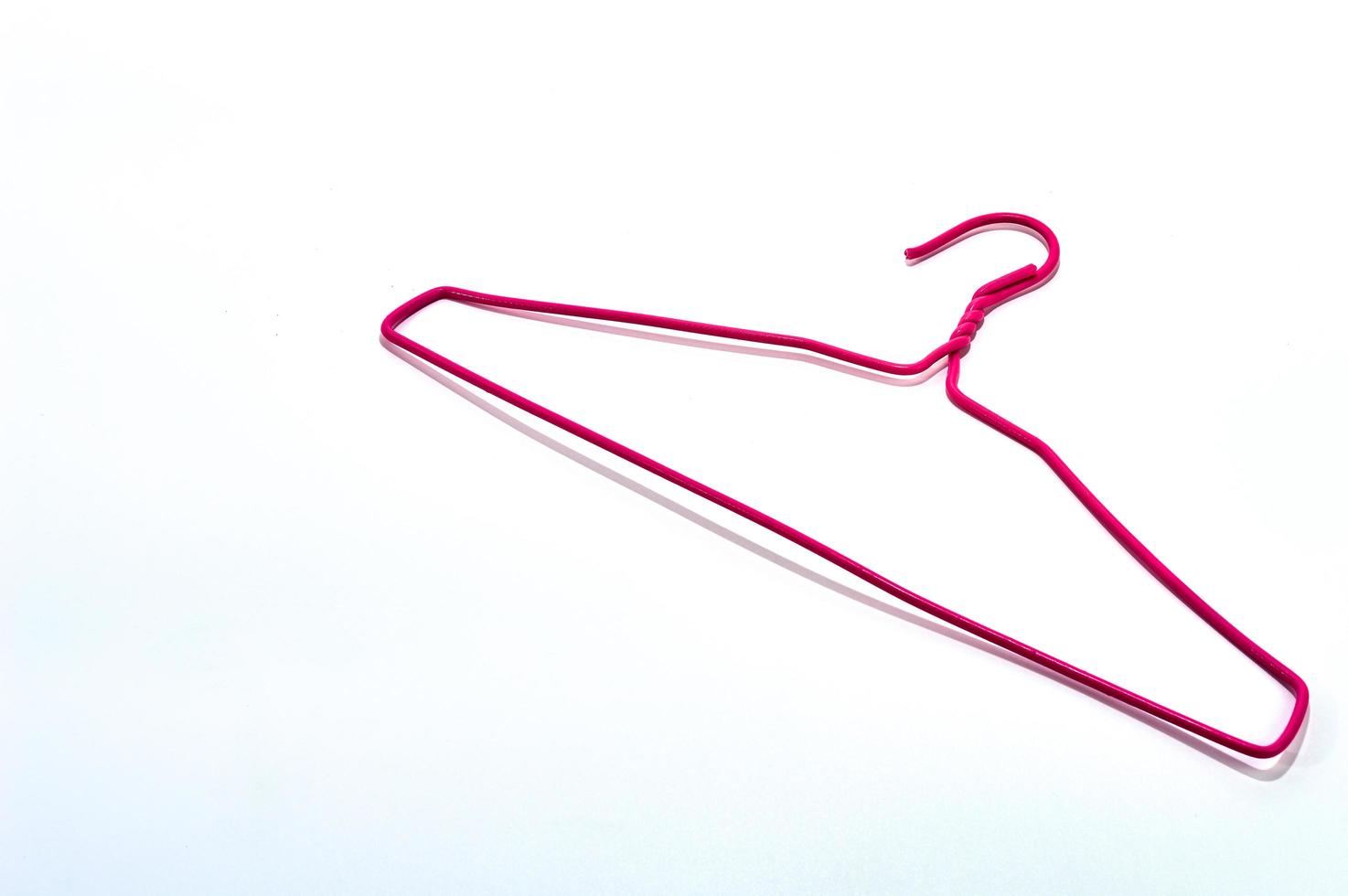 Pink hanger object on a white background. photo