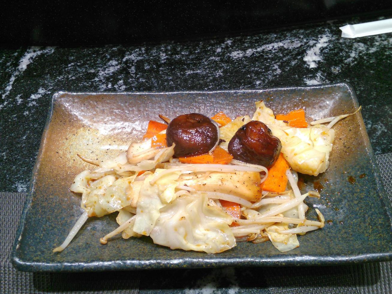 Stir Fried Vegetables in Japanese Soy Sauce On a terracotta pot. photo