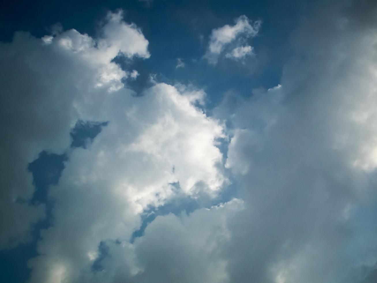 The sky is blue the clouds are white. photo