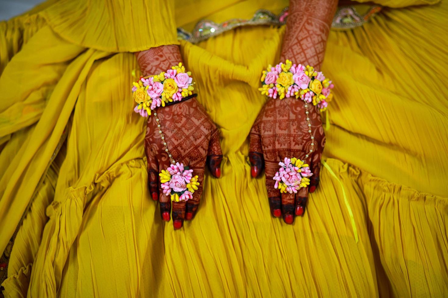 Close up of hands of beautiful bride photo