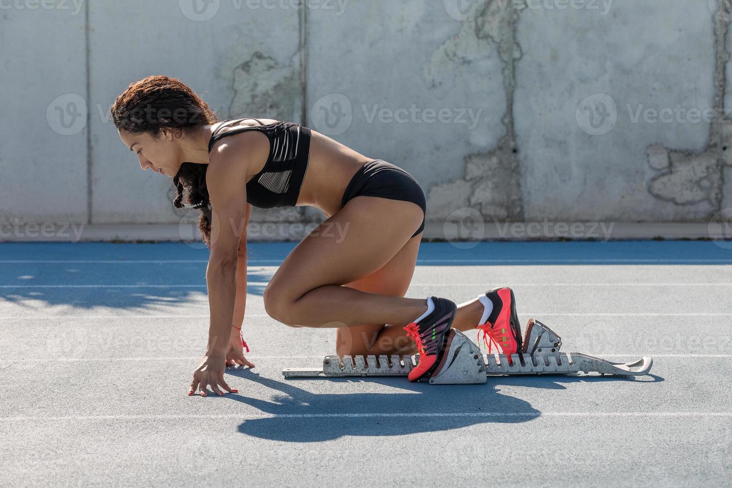 athlete woman in starting position photo