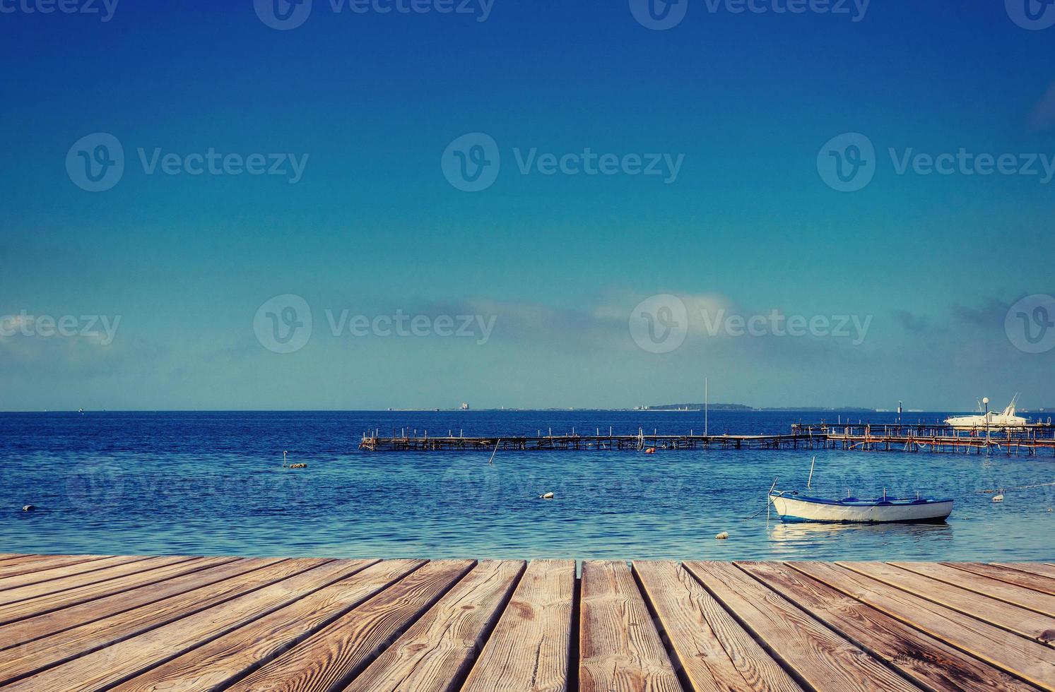 yacht on the background of sea and sky photo
