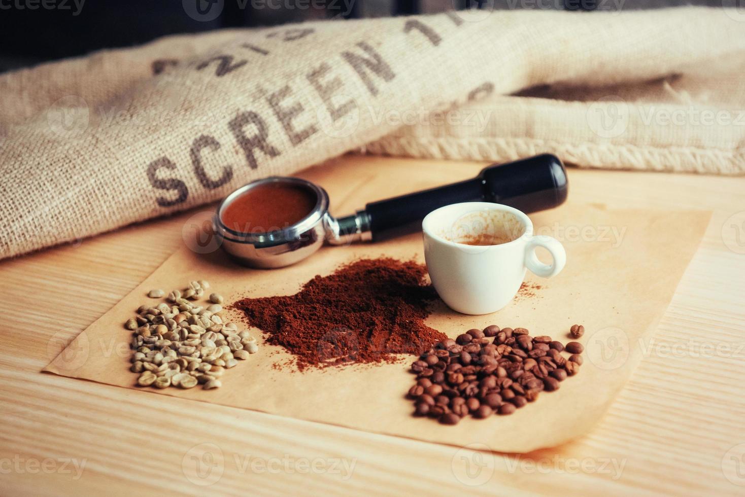 Top view cup of coffee and three different varieties photo