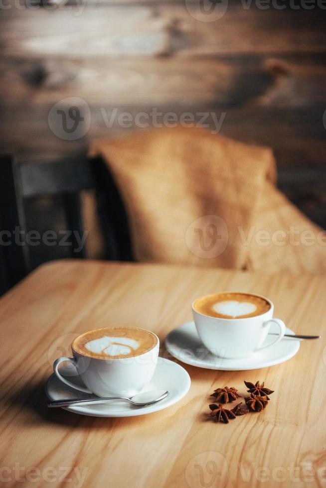 Two cups of gourmet coffee house cappuccino photo