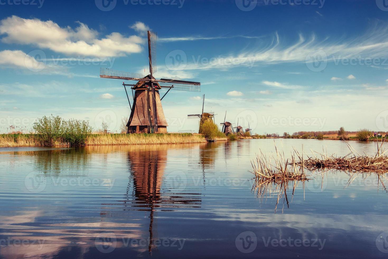 Traditional Dutch windmills from the channel Rotterdam. Holland photo