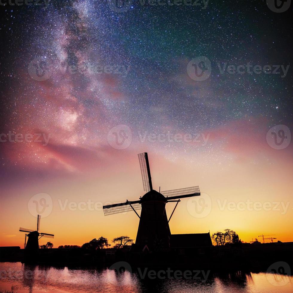 Dutch mill at night. Starry sky. Holland. Netherlands photo