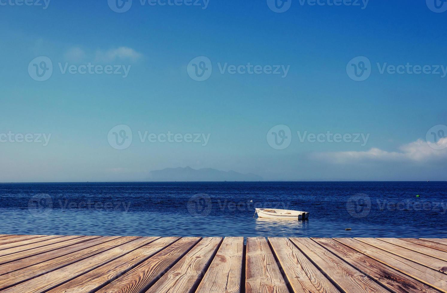 yacht on the background of sea and sky photo