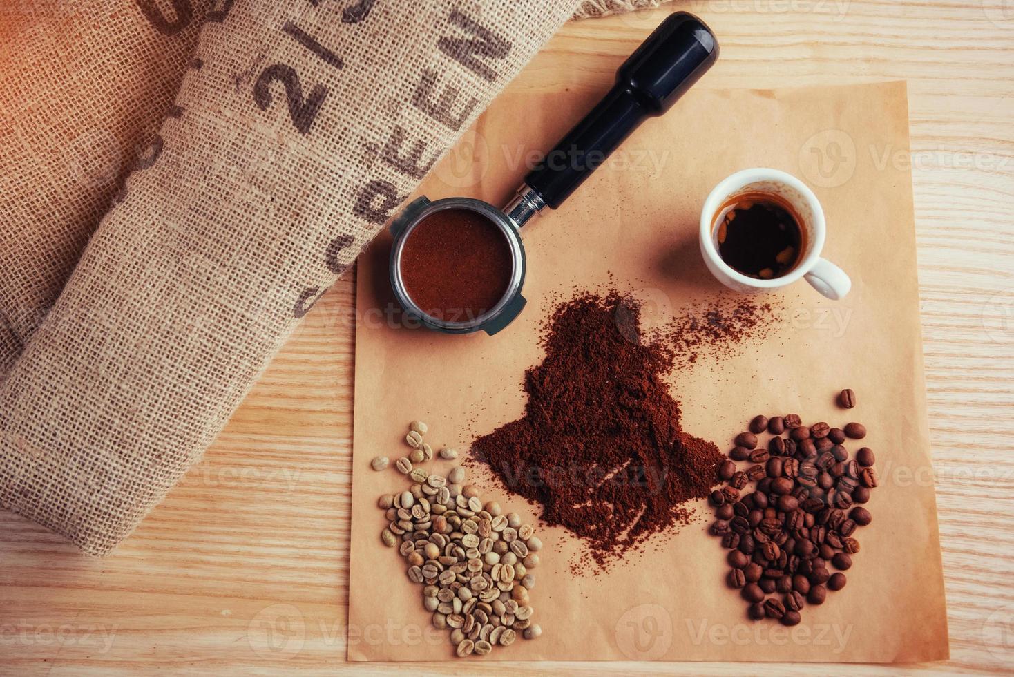 Top view cup of coffee and three different varieties photo