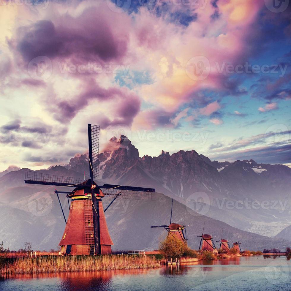 Traditional Dutch windmills from the channel Rotterdam. Holland photo