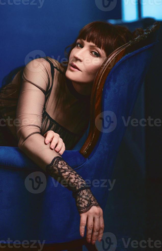 woman in vintage dress indoor photo