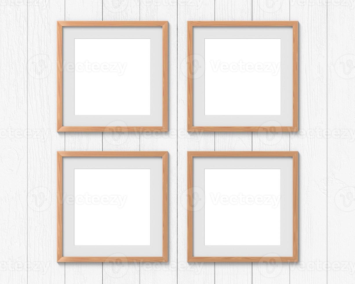 Set of 4 square wooden frames mockup with a border hanging on the wall. Empty base for picture or text. 3D rendering. photo