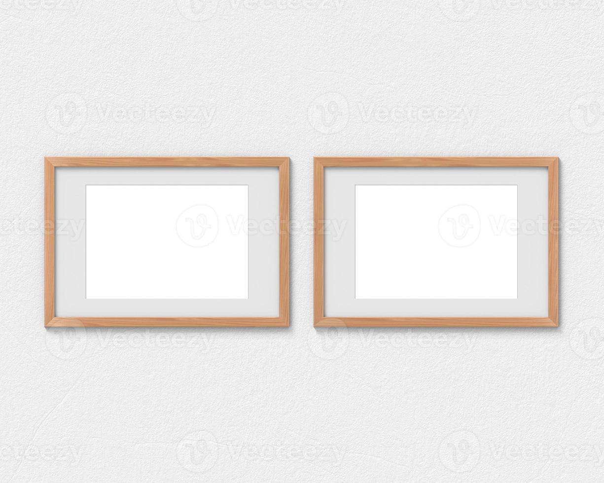 Set of 2 horizontal wooden frames mockup with a border hanging on the wall. Empty base for picture or text. 3D rendering. photo