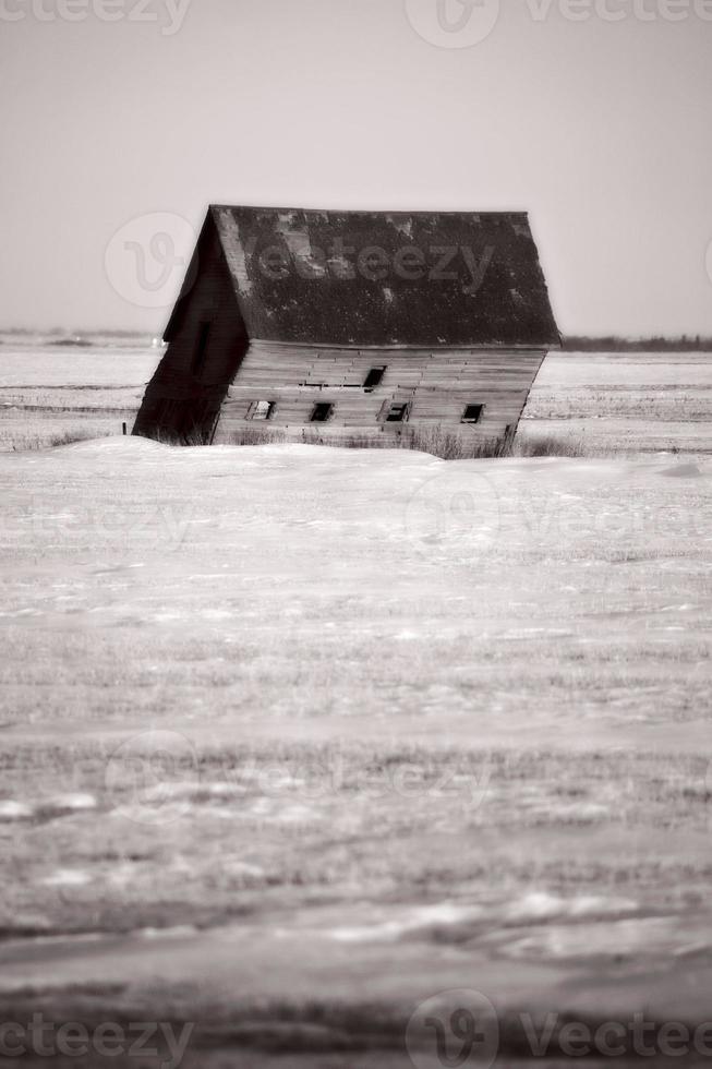 Abandoned farm buildings in Saskatchewan photo