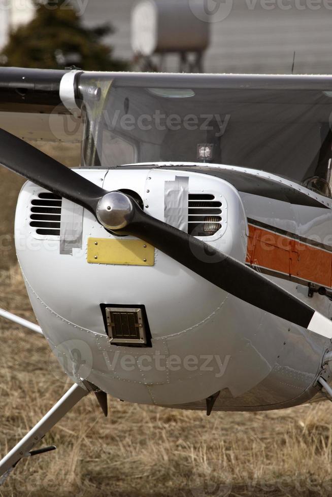 New airplane in stubble field photo