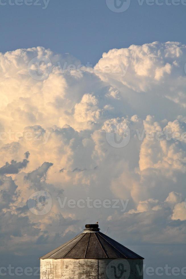 Thunderhead forming over an old Saskatchewan granary photo