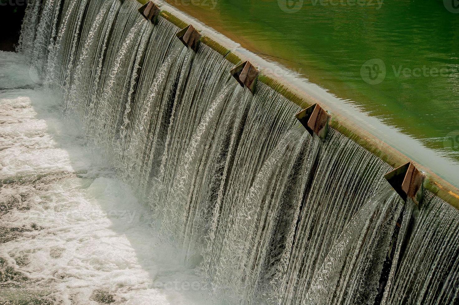 Barrier to slow down the flow of water photo