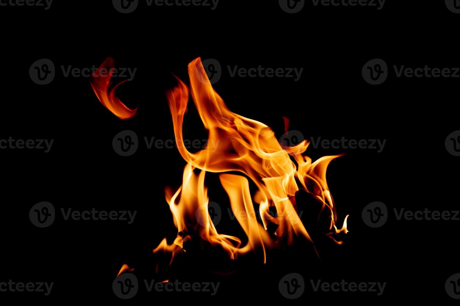 Fire flame texture. Burning material backdrop. Burn effect pattern. Blaze and torch wallpaper. Heat and haze backdrop. photo