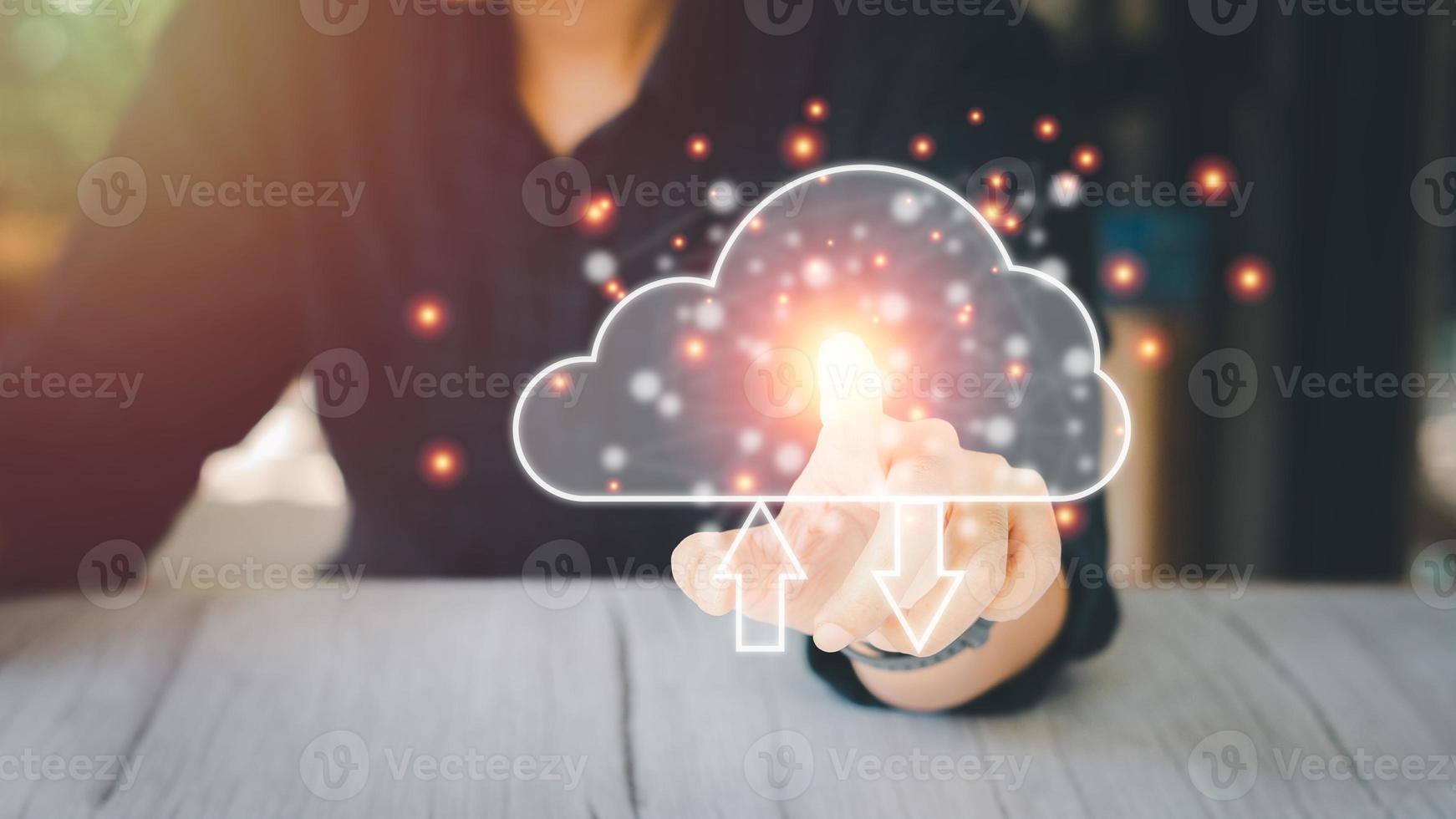 Cloud data storage concept. Finger-pointing to cloud computing with transfer arrow. Communication of business and financial. Large database and synchronize with the internet and technology. photo