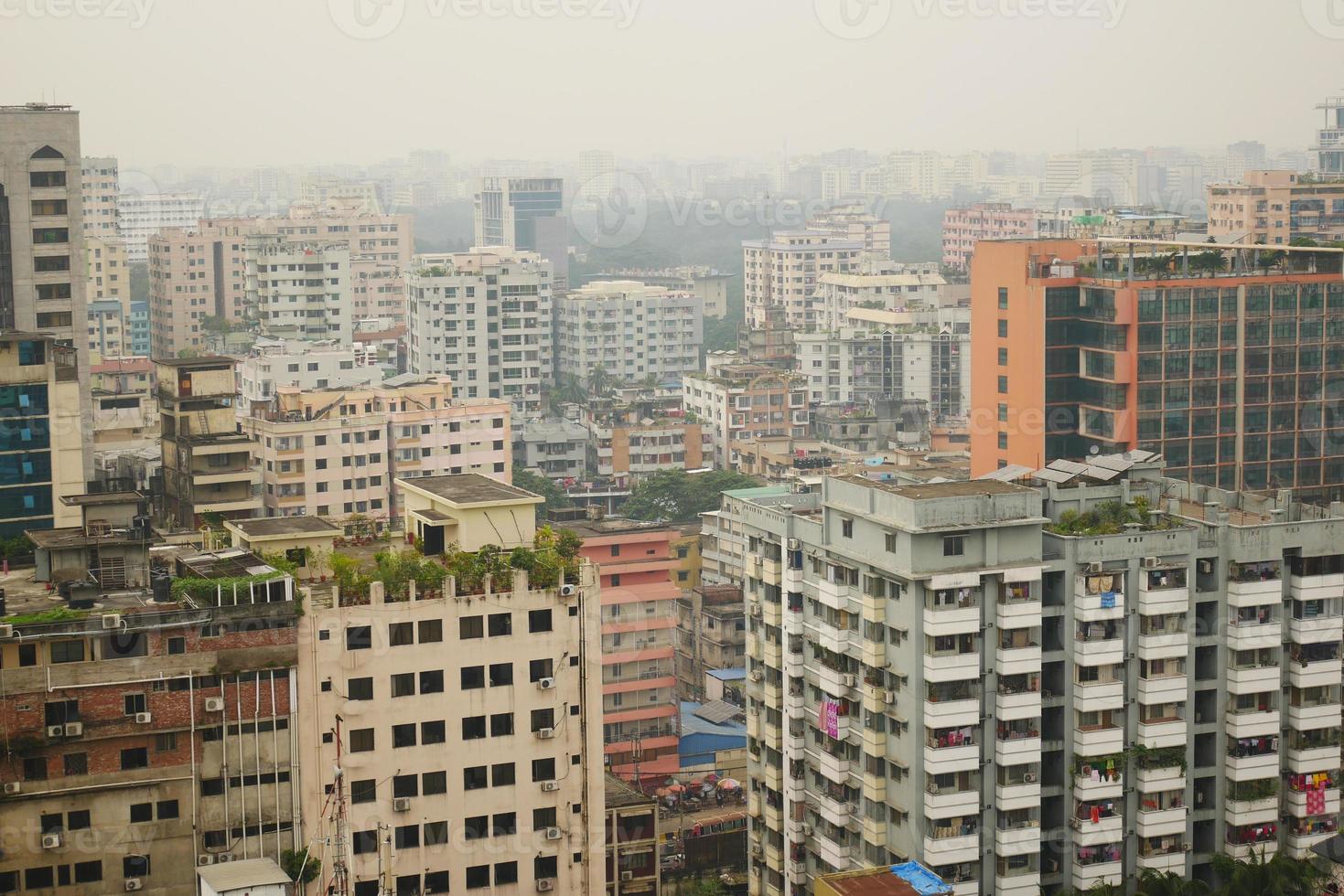 high angle view of dhaka city residential and financial buildings at sunny day photo