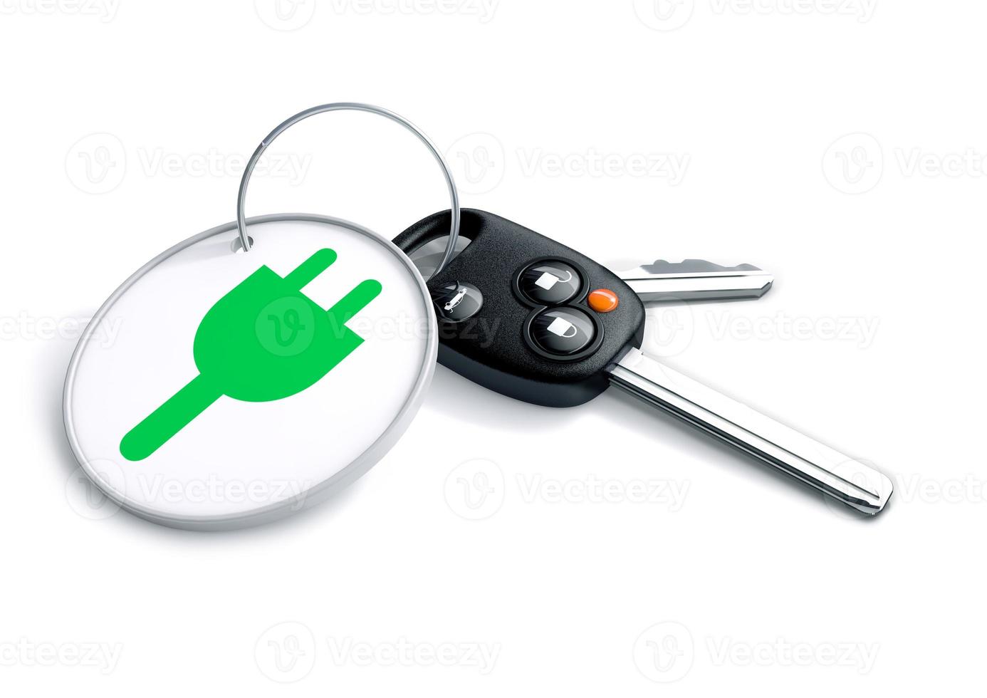 Set of car keys with keyring and electric power icon on it. Zero emmisions and green vehicles. Concept for converting consumers to using electric powered vehicles and cars in the future. photo